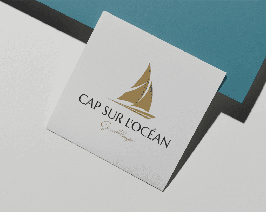 Le logo du cap sur docean avec gardel sur fond bleu.